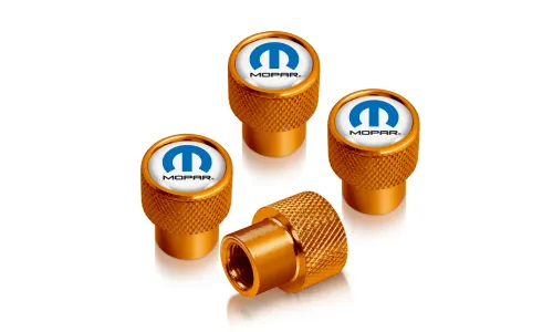 Колпачки ниппелей Mopar на белом фоне в золотистом корпусе — фото 1