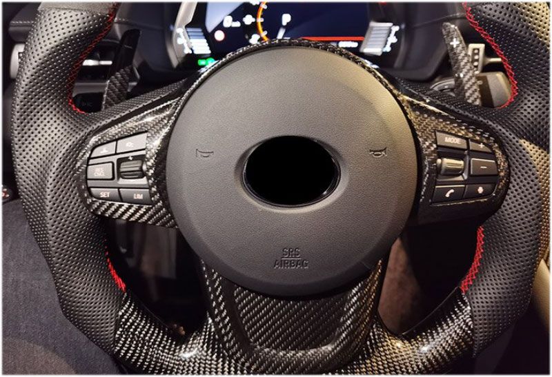 Накладки на рулевое колесо, карбон, 2 части, для Toyota Supra 5 A90 (2019-2025) — фото 1
