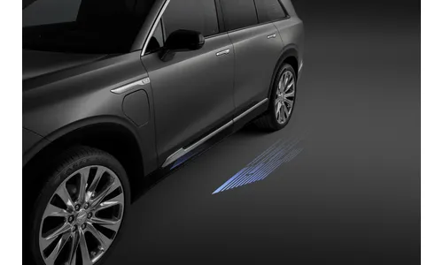 Проекционная подсветка порогов для Cadillac VISTIQ I, Platinum, GM — фото 1