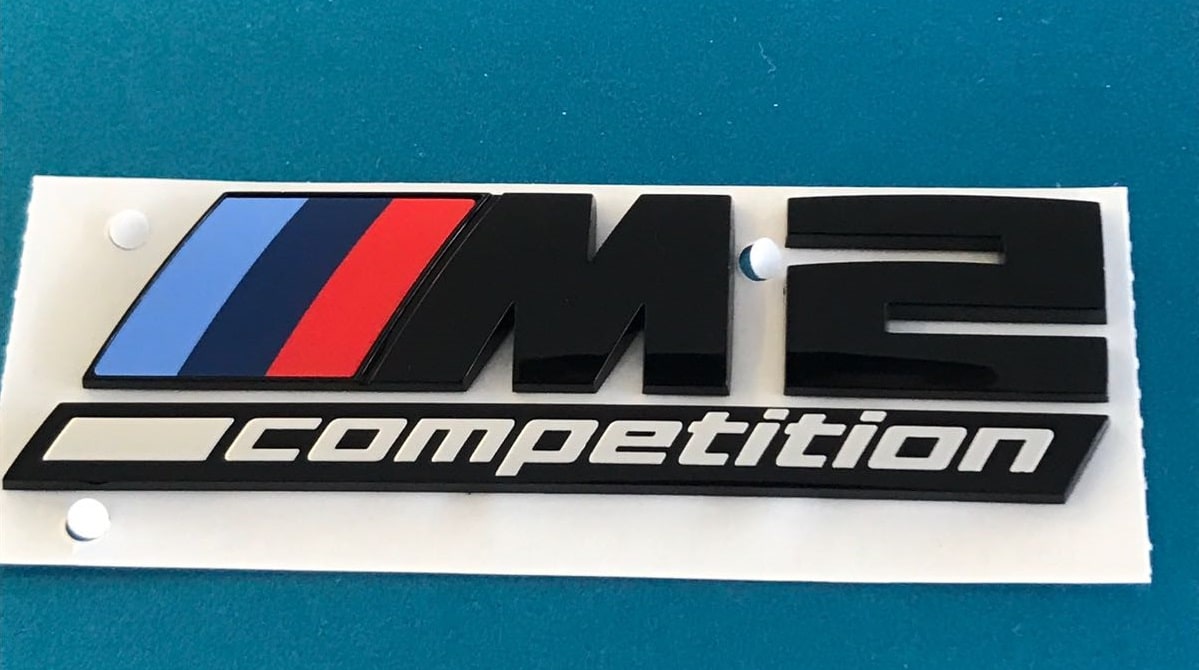 Эмблема M2 Competition чёрная для BMW M2 F87, 100 × 35 мм, оригинал — фото 1