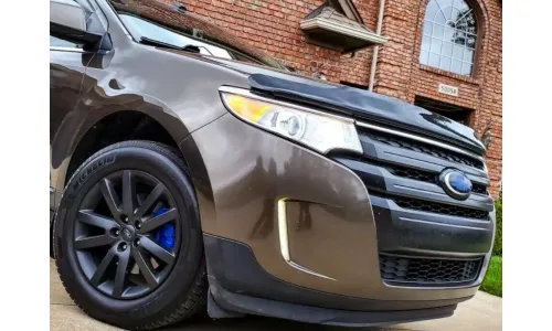 Защита от дымовых жуков AVS Bugflector II с болтовым креплением для внедорожника Ford Edge 2011-2014 годов выпуска — фото 1