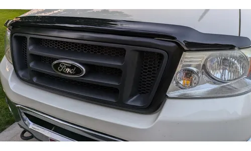 Дефлектор капота Hood Shield для Ford F-150 (2004–2008), Lincoln Mark LT (2006–2008), высокий профиль, тёмно-дымчатый Husky Liners — фото 1