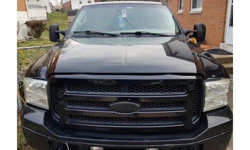 Дефлектор капота Aeroskin для Ford F-250/F-350/F-450 (1999–2007), тёмно-дымчатый Husky Liners — фото 1